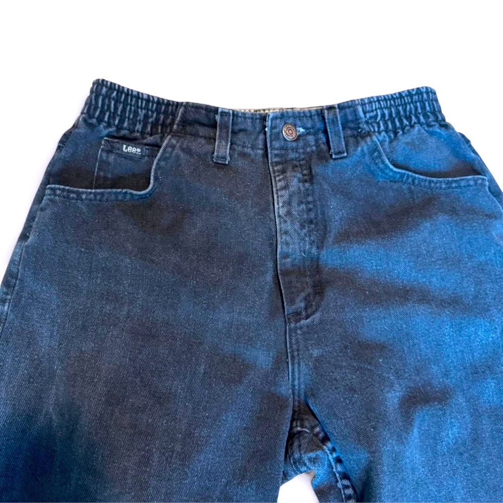 Lee Women's High Rise Dark Blue Jeans faded partial
Elastic waist size 6